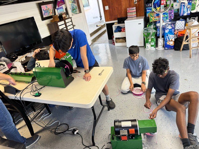 Team working on filament recycling